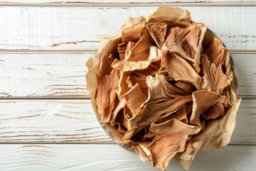 Poster - Dehydrated turkey or chicken meat packed in brown paper homemade dog treats White wooden background with space for logo