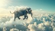 Dreamy flight of an elephant among clouds