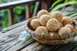 Indonesian sesame seed balls onde onde on wooden background