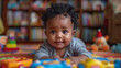 © pattozher - black baby child playing with blocks