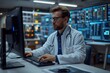 © Good Shot - A medical professional works on a computer with complex data analysis for patient care.