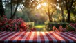 Sunlit garden picnic setting with red checkered tablecloth