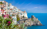 Fototapeta  - Welcome to Italy concept image. Beautiful Amalfi on hills leading down to coast, Campania, Italy