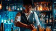 Bartender preparing cocktails in a dimly lit bar with warm ambiance