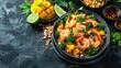 Khao Kluk Kapi Thai Shrimp Paste Fried Rice with Fresh Mango and Vibrant Vegetables on Slate Background