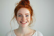 © igorfrost - portrait of young redhead woman with freckles, smiling. girl with long red wavy hair looking happy and radiant. ginger female on white background, isolated with copy space