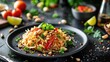 Delectable Thai Pad Thai Noodles Served on a Plate with Lime and Peanuts