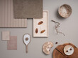 Elegant flat lay composition with textile and paint samples, panels and cement tiles. Stylish interior designer moodboard. Light beige and gray color palette. Copy space. Template.