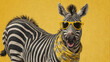 A quirky perspective with a zebra wearing yellow sunglasses and a matching scarf against a bold yellow background