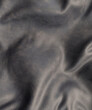 Looking down onto a piece of wrinkled black leather close up 3d render