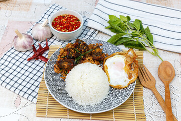 Wall Mural - Stir-Fried Basil and Stir Fried Chili with Century Egg and Minced Pork Spicy Thai food