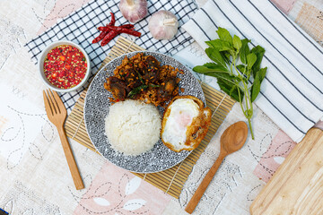 Wall Mural - Stir-Fried Basil and Stir Fried Chili with Century Egg and Minced Pork Spicy Thai food