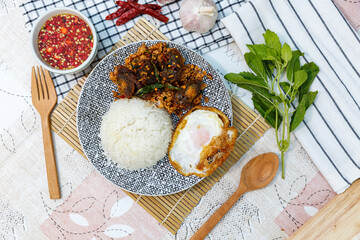 Wall Mural - Stir-Fried Basil and Stir Fried Chili with Century Egg and Minced Pork Spicy Thai food