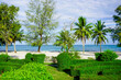 Beach in Sihanoukville. Palm trees and blue sea