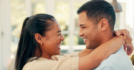 Poster - Laughing, face and a happy couple embrace at home with love, care and romance. Young woman and a man together in an apartment to hug, relax and bond for happiness, quality time and commitment