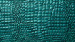 Turquoise green texture of crocodile leather background