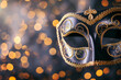 Luxury venetian mask on dark silver bokeh background. New year eve and christmas party celebration design banner. Fantasy carneval masquerade event costume