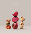 Creative layout made of beetroot, tomato and champignon on the beige background. Food concept. Macro concept.