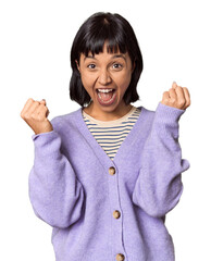 Sticker - Young Hispanic woman with short black hair in studio cheering carefree and excited. Victory concept.