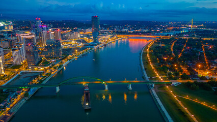 Sunset over Downtown Belgrade viewed behind the Sava river in Se