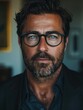 Bearded Man With Glasses Staring at the Camera