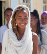 Ethiopian women in white attractively smiling and looking at the camera