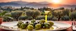 Olive oil and delicious olives on background of picturesque olive grove and mountain village.