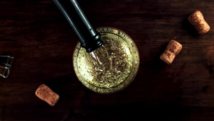 Poster - Super slow motion Champagne is poured into a glass with air bubbles. High quality FullHD footage