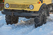 Off-road vehicle with snow chains