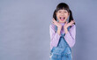 Portrait of cut little asian girl screaming out (expression, facial), beauty portrait of young asian happy sweet young student girl woman. Fun beauty smile concept