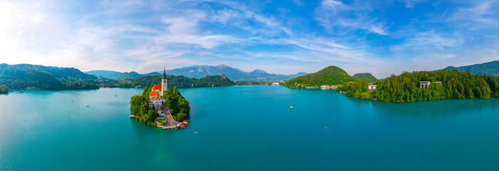 Canvas Print - Assumption of Maria church and Bled Castle at lake Bled in Slovenia