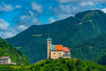 Wall Mural - Church of Saint Anthony and panorama of Slovenian town Idrija