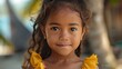 children of marshall islands, A portrait of a smiling young girl wearing a yellow dress with a blurred background that evokes a sense of innocence and joy