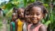 children of saint vincent and the grenadines, A smiling child with friends lined up in the background in a lush, green outdoor setting. 