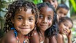 Children of Suriname. A group of joyful children with bright smiles posing together outdoors surrounded by greenery. 
