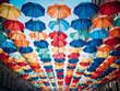 © Llama-World-studio - Colorful umbrellas sway in the wind in an abstract street decoration