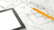 © JovialFox - digital tablet and yellow pencil on house plan