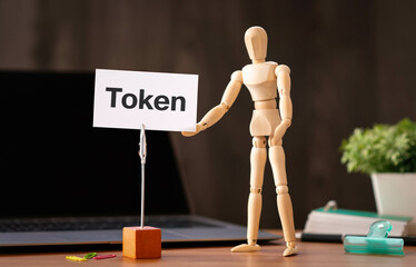 Poster - There is word card with the word Token. It is as an eye-catching image.