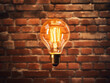 Edison filament bulbs add vintage charm to brick wall decor