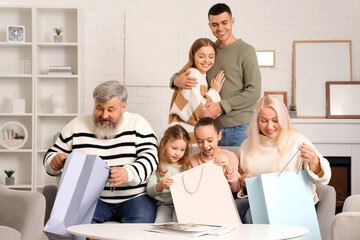 Wall Mural - Big family with gift bags at home