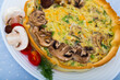 Delicious shortcrust pastry pie with porcini mushrooms, shiitake and champignons with sauce of Philadelphia and Cheddar cheese and yolks