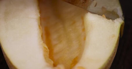 Wall Mural - cut ripe yellow melon on the table, ripe melon for nutrition cut into pieces