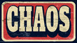 Aged and worn chaos sign on wood