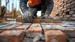 Close-up of a construction worker bricklaying with precision, soft tones, fine details, high resolution, high detail, 32K Ultra HD, copyspace