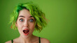 Woman with shocked expression and green hair