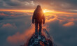  man standing on top of a mountain as the sun sets. Goals and achievements concept