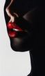 Woman's Face with Sexy Red Lips in Highlight of Spotlight and Shadows