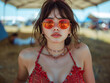 Portrait of young sexy woman under shade at summer music festival