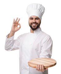 Sticker - Happy young chef in uniform holding wooden board and showing ok gesture on white background