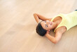 © peopleimages.com - Lay, relax and portrait of woman on floor for weekend break, chilling and satisfaction in home. Female person, mockup and smile with rest on ground for happy, positivity or stress relief from above